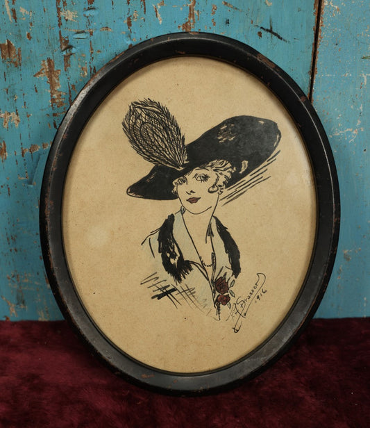 Lot 070 - Antique Drawing Of Woman With Large Feather Hat, Demure Appearance, Signed F.A. Strasser, 1916, Appears To Be Pen And Ink With Colored Pencil, May Be Print, In Oval Frame