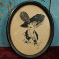 Lot 070 - Antique Drawing Of Woman With Large Feather Hat, Demure Appearance, Signed F.A. Strasser, 1916, Appears To Be Pen And Ink With Colored Pencil, May Be Print, In Oval Frame