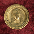 Lot 105 - Antique Heavy Cast Metal Circle Plaque With Woman's Face, Scaled Hair Design, Three Mounting Holes