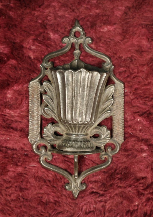 Lot 109 - Antique Cast Iron Wall Pocket Match Safe Match Holder With Strikes On Sides, Urn At Center, Patented January 16, 1867