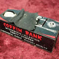 Lot 112 - Vintage Coffin Bank Mechanical Bank, Mysterious Hilarious Part Stopper Novelty, Note Damage To Fingers, Mechanism Malfunctions, Operates Intermittently
