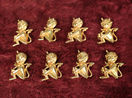 Lot 118 - Eight Vintage Brass Little Devil "Hot Stuff" Pinback Pins, Brooches Grouping