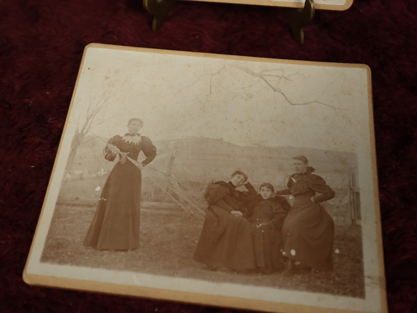 Lot 158 - Pair Of Boarded Photos Of Victorian Ladies Hanging Out On And Around Hammock