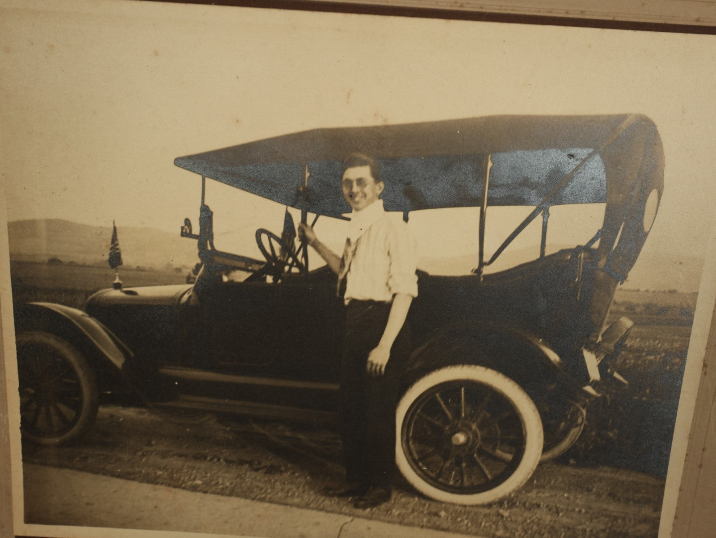 Lot 160 - Grouping Of Three Transportation Related Photos - Man With Early Automobile, Man On Horse And Buggy, And Horse In Front Of House, Including By Haas Photographer Of New York