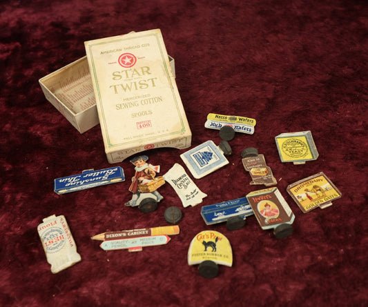 Lot 166 - Grouping Of Advertising Game Pieces In Star Twist Sewing Cotton Box