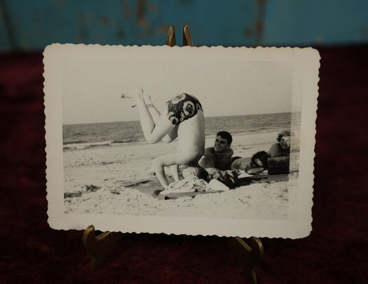 Lot 168 - Single Snapshot Photo - Boy On Beach Doing Headstand