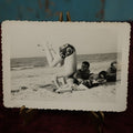 Lot 168 - Single Snapshot Photo - Boy On Beach Doing Headstand