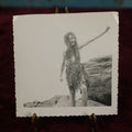 Lot 173 - Single Snapshot Photo - Young Boy Or Girl On The Coast Wearing Sea Weed As Hair, Skirt