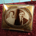 Lot 004 - Large Antique Reverse-Painted Goofus Glass Photo Mounting Of Couple By H.D. Sterrick, Pittsburgh, Pennsylvania