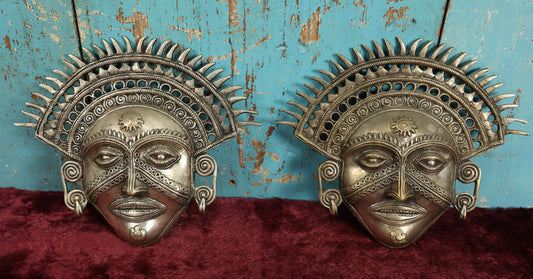 Lot 007 - Pair Of Exotic Vintage Cast Metal Masks, Silver In Color, With Ornate Details, Teeth, Hangers On Back