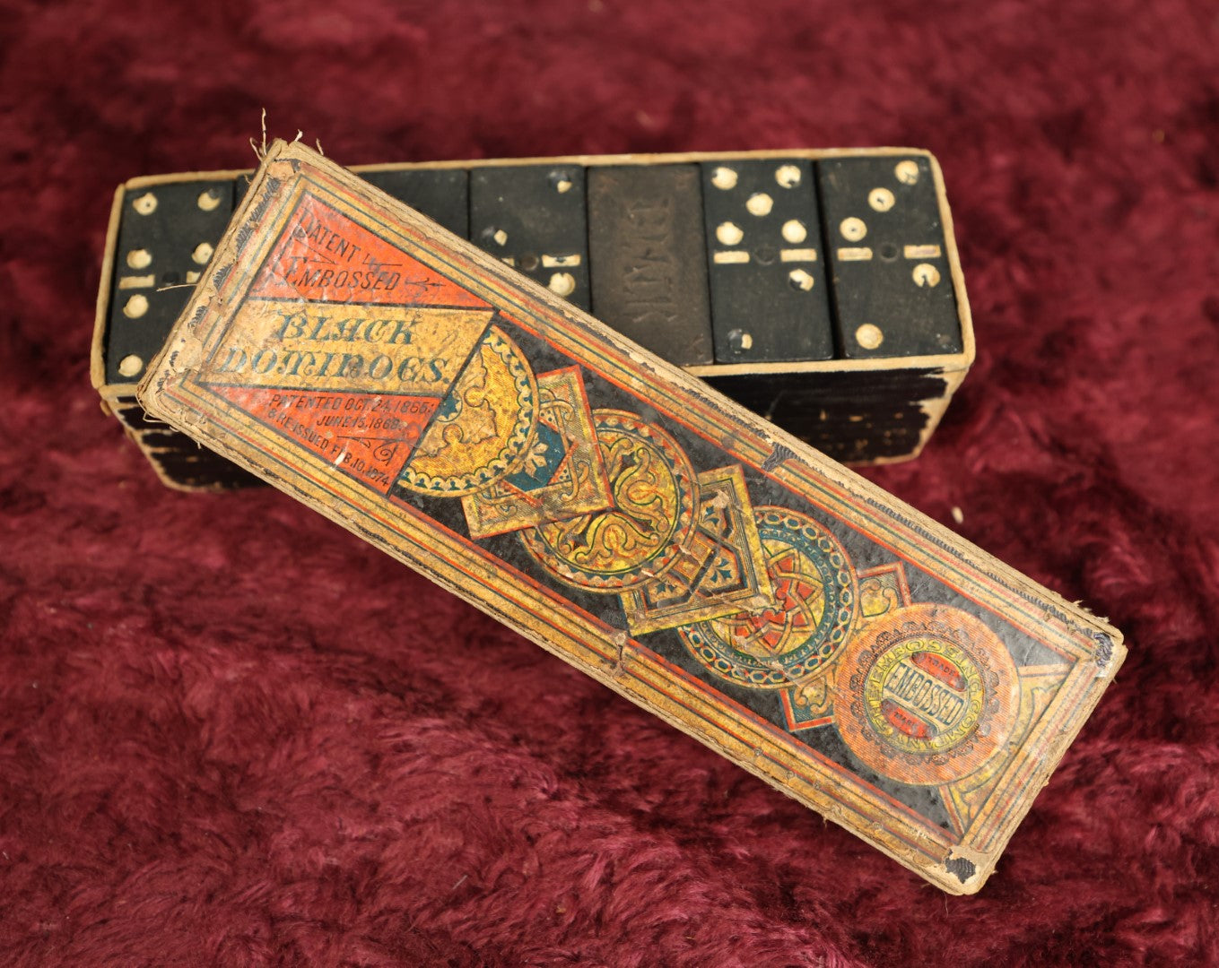 Lot 029 - Antique Embossed Black Dominoes, Patented 1865 & 1869, Re-Issued 1874, In Original Box, Appears Complete