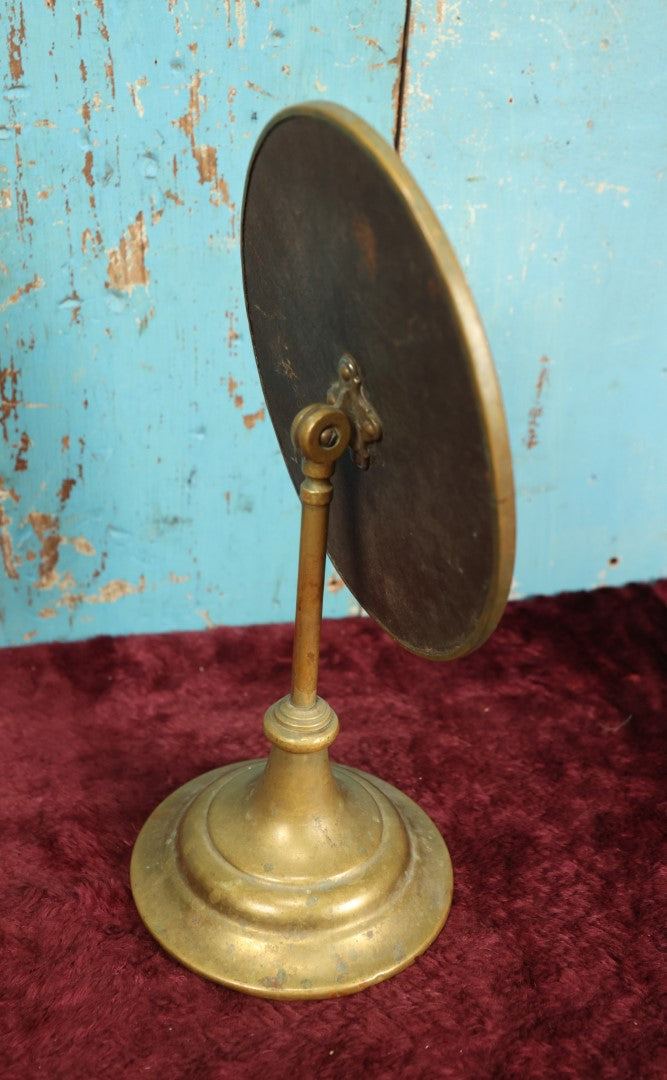 Lot 034 - Antique Brass Beveled Glass Swivel Base Shaving Mirror