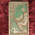 Lot 039 - Antique Art Deco Match Holder Pill Box With Remnants Of Green Paint, Nude Woman On Swing, Note Heavy Wear, Paint Loss, Given To John K. From Karen