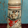 Lot 047 - Antique Hand Painted German Strong Man Stein With Weight Lifter, Metal Top, Two Liter, Note Heavy Damage, Repairs, Wear, Cracking