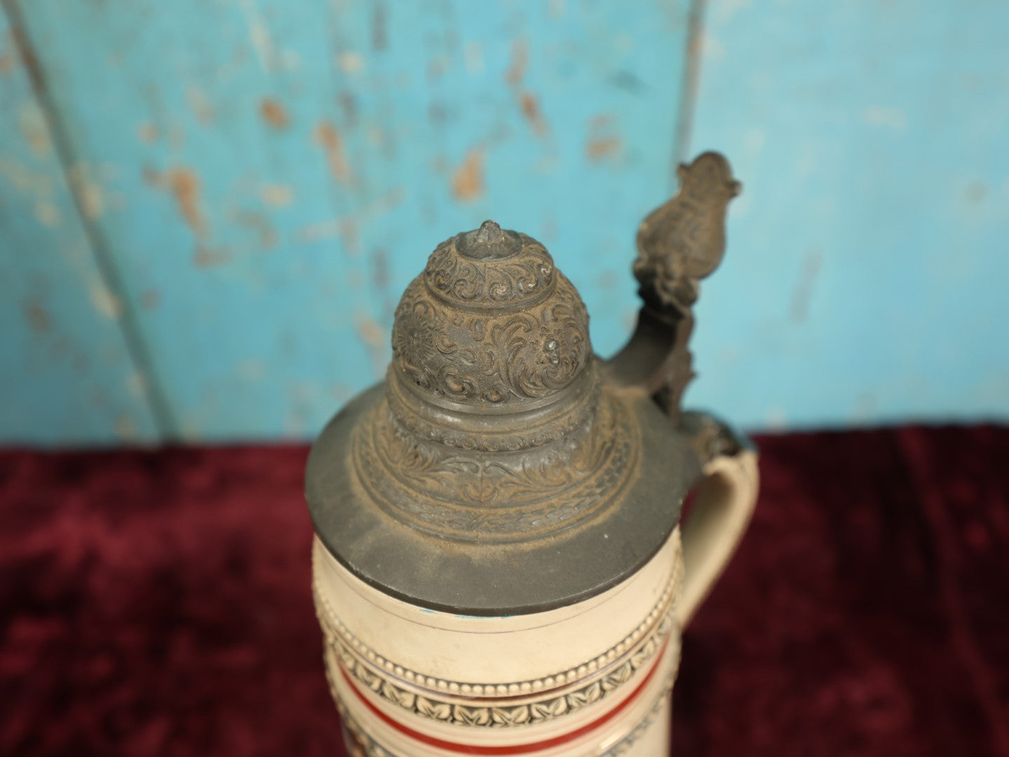 Lot 047 - Antique Hand Painted German Strong Man Stein With Weight Lifter, Metal Top, Two Liter, Note Heavy Damage, Repairs, Wear, Cracking