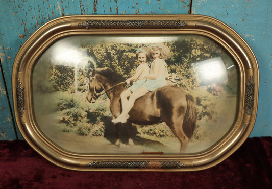 Lot 062 - Vintage Framed Bubble Glass Photo Of Two Girls Riding Pony, Identified On Back, Eunice Crissey Kelley, Virginia Crissey Wisner, 1938