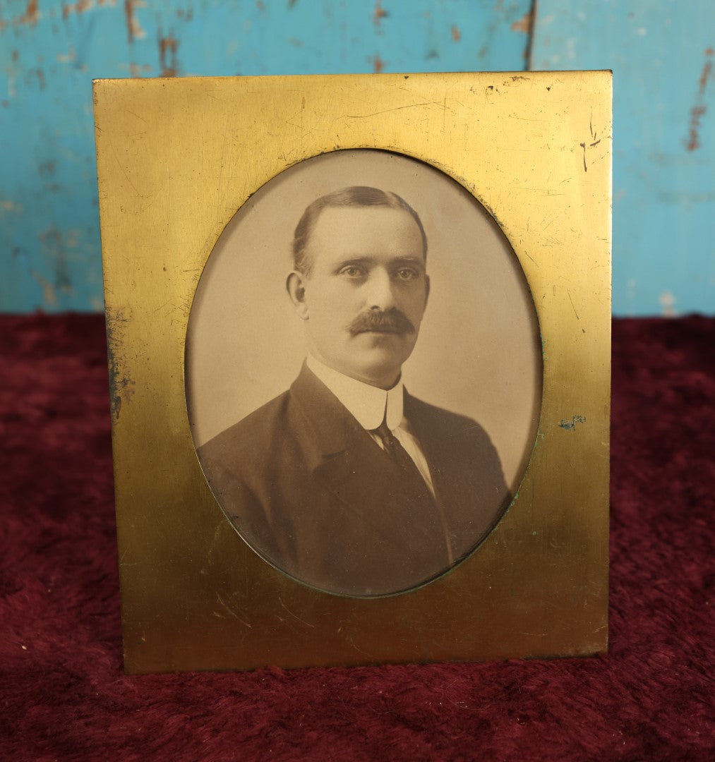 Lot 064 - Antique Brass Bradley And Hubbard Photo Frame With Photo Of Man With Mustache, Note Wear, Corrosion