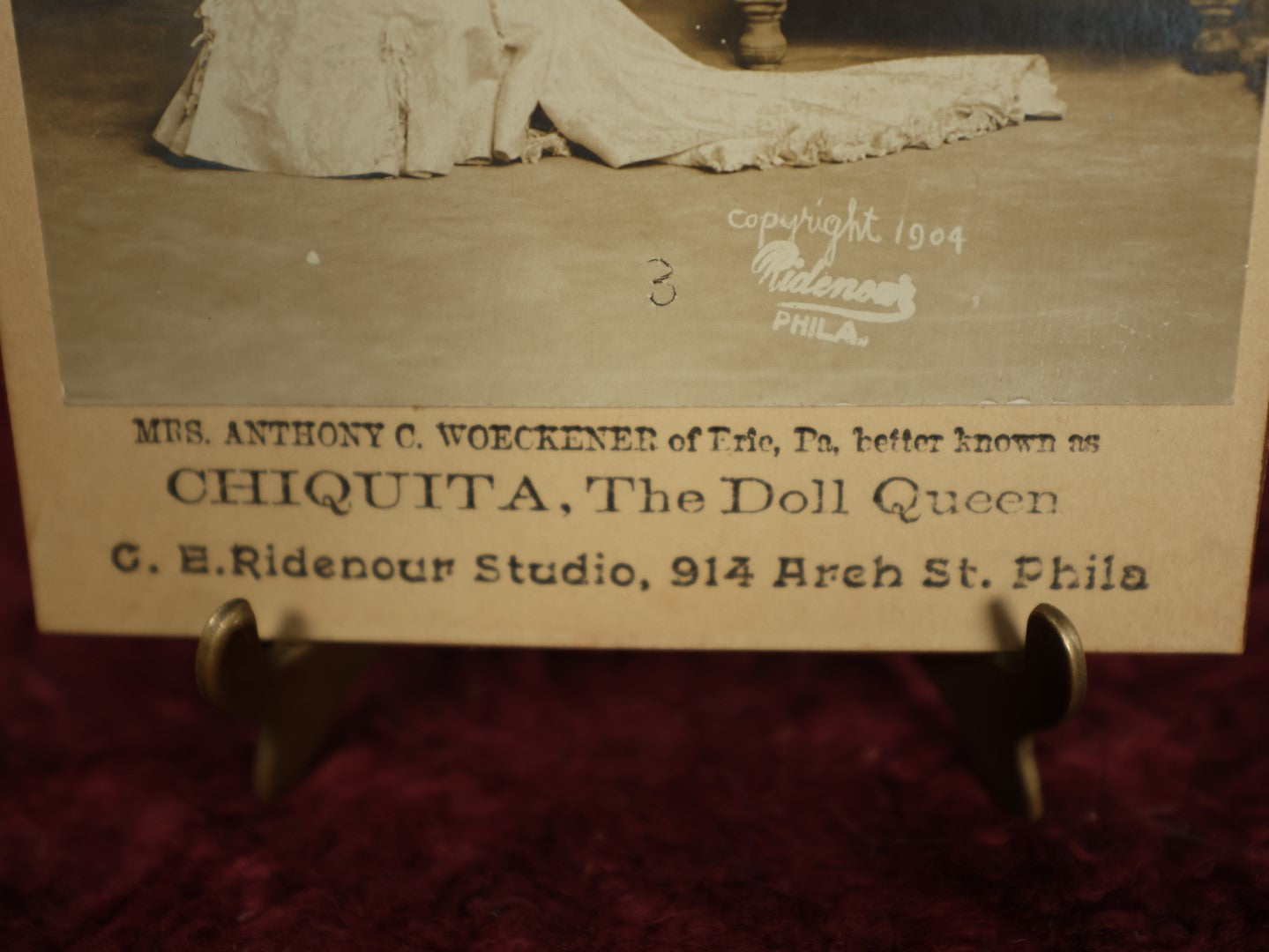 Lot 066 - Antique Side Show Cabinet Card Of Little Person Mrs. Anthony C. Woeckener Of Erie, Pennsylvania, Better Known As Chiquita, The Doll Queen, C.E. Ridenour Studio Photographers, Philadelphia, Pennsylvania, Copyright 1904