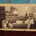 Lot 067 - Antique Interior Boarded Photo, Likely From A College Campus, Of Two Men With Tennis Rackets, Early Light Fixtures, Furniture, Back Marked Professor N.J. Merrill, 1889