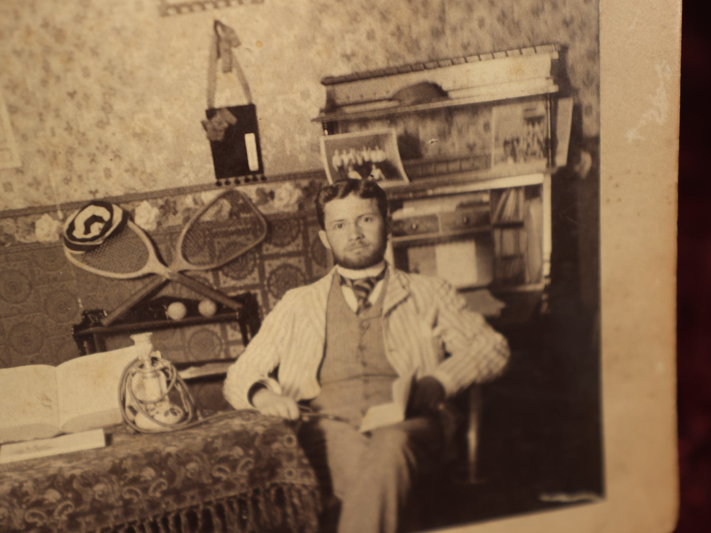 Lot 067 - Antique Interior Boarded Photo, Likely From A College Campus, Of Two Men With Tennis Rackets, Early Light Fixtures, Furniture, Back Marked Professor N.J. Merrill, 1889