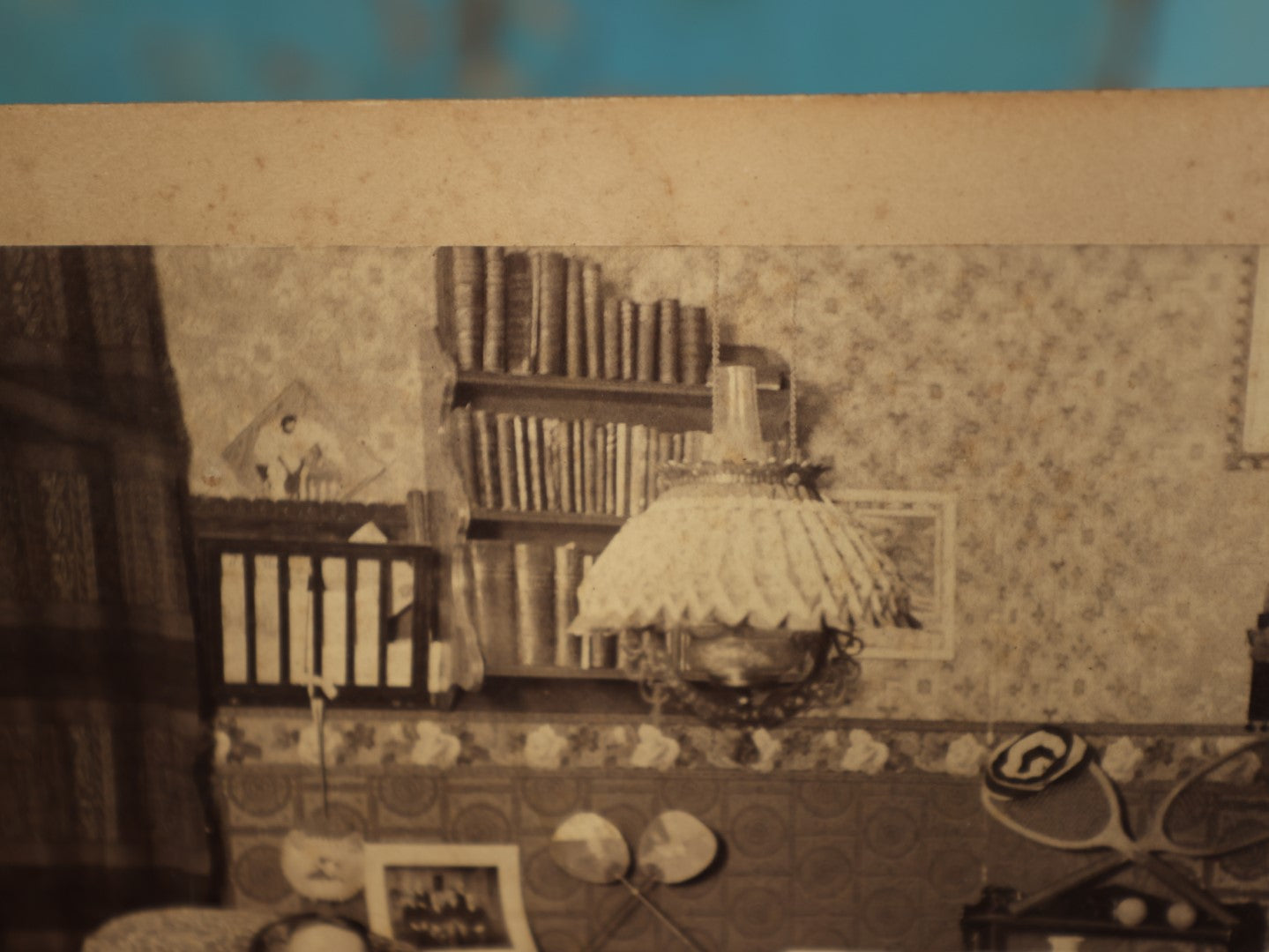 Lot 067 - Antique Interior Boarded Photo, Likely From A College Campus, Of Two Men With Tennis Rackets, Early Light Fixtures, Furniture, Back Marked Professor N.J. Merrill, 1889