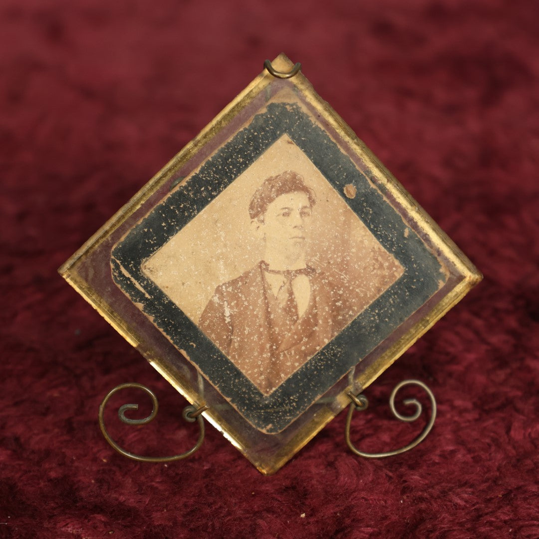 Lot 070 - Small Antique Boarded Photo In Unique Brass Wire Frame With Glass Plate, Note Wear To Photo, Chip In Glass, Wear To Reverse Gold Paint On Glass