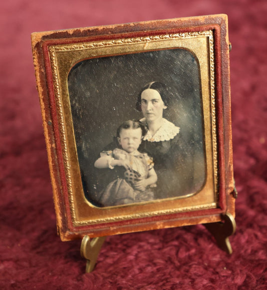 Lot 071 - Antique 1/6th Plate Daguerreotype Photograph Of A Mother Holding Daughter, Wearing Lace Gloves, Full Split Case With Woman Holding Cornucopia