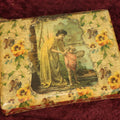 Lot 104 - Antique Craft Grade Cabinet Card Photo Album With Celluloid Cover Of Woman And Child On Riverside, Containing Several Cabinet Cards, And Tintypes, Mostly Empty, Heavy Wear
