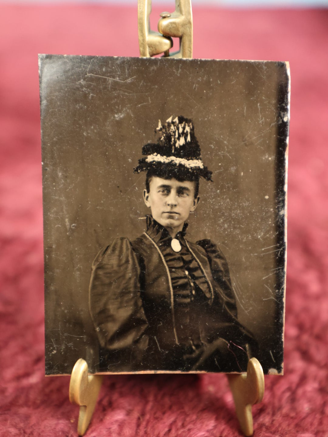 Lot 117 - Single Tintype Photo, Woman In Ornate Hate, Frilly Collar, Brooch