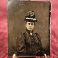 Lot 117 - Single Tintype Photo, Woman In Ornate Hate, Frilly Collar, Brooch
