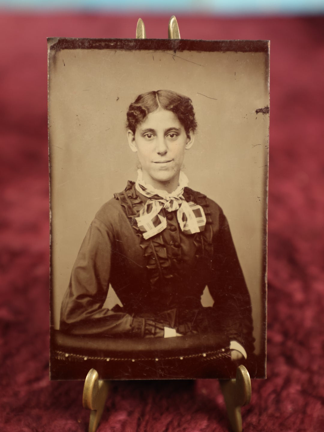 Lot 119 - Single Tintype Photo, Woman With Slight Smile, Checkered Scarf Bough