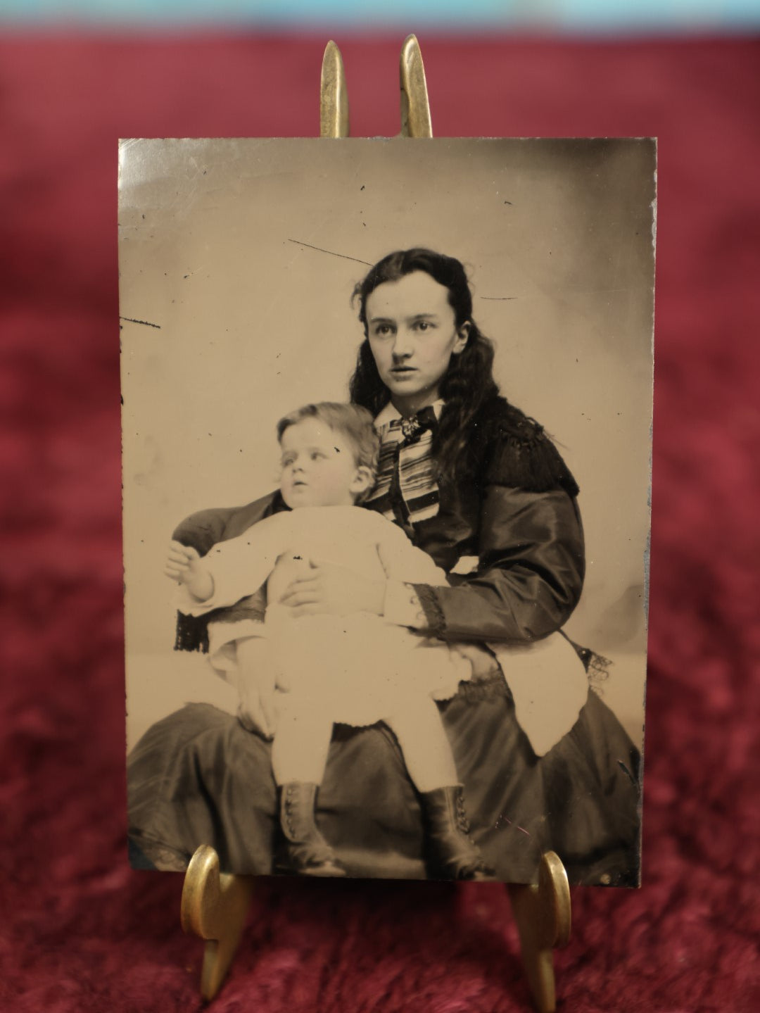 Lot 125 - Single Tintype Photo, Young Mother With Child, Child Distracted Off Frame