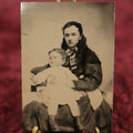 Lot 125 - Single Tintype Photo, Young Mother With Child, Child Distracted Off Frame
