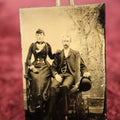 Lot 127 - Single Tintype Photo, Man And Woman Seated, Man Holding Bowler Hat, With Watch Chain