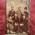 Lot 128 - Single Tintype Photo, Group  Of Three Men, Three Women, One Woman Has Large Cross Necklace, Another Is Hiding Her Mouth Behind A Fan