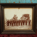 Lot 054 - Antique Framed Boarded Photo Of Soldiers With Various Ribbons, Flag, Etc., Possibly Nebraska Volunteers Or Militia, As Written On Back Of Frame