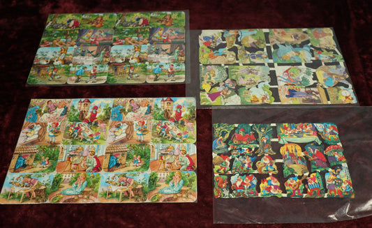 Lot 058 - Grouping Of Four Uncut Die Cut Scrapbooking Paper Sheets, Depicting Various Fairy Tales Including Snow White And More, Printed In Germany