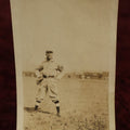 Lot 115 - Single Snapshot Photo, Early Baseball Photo, Man With Glove, Logo On Sleeve