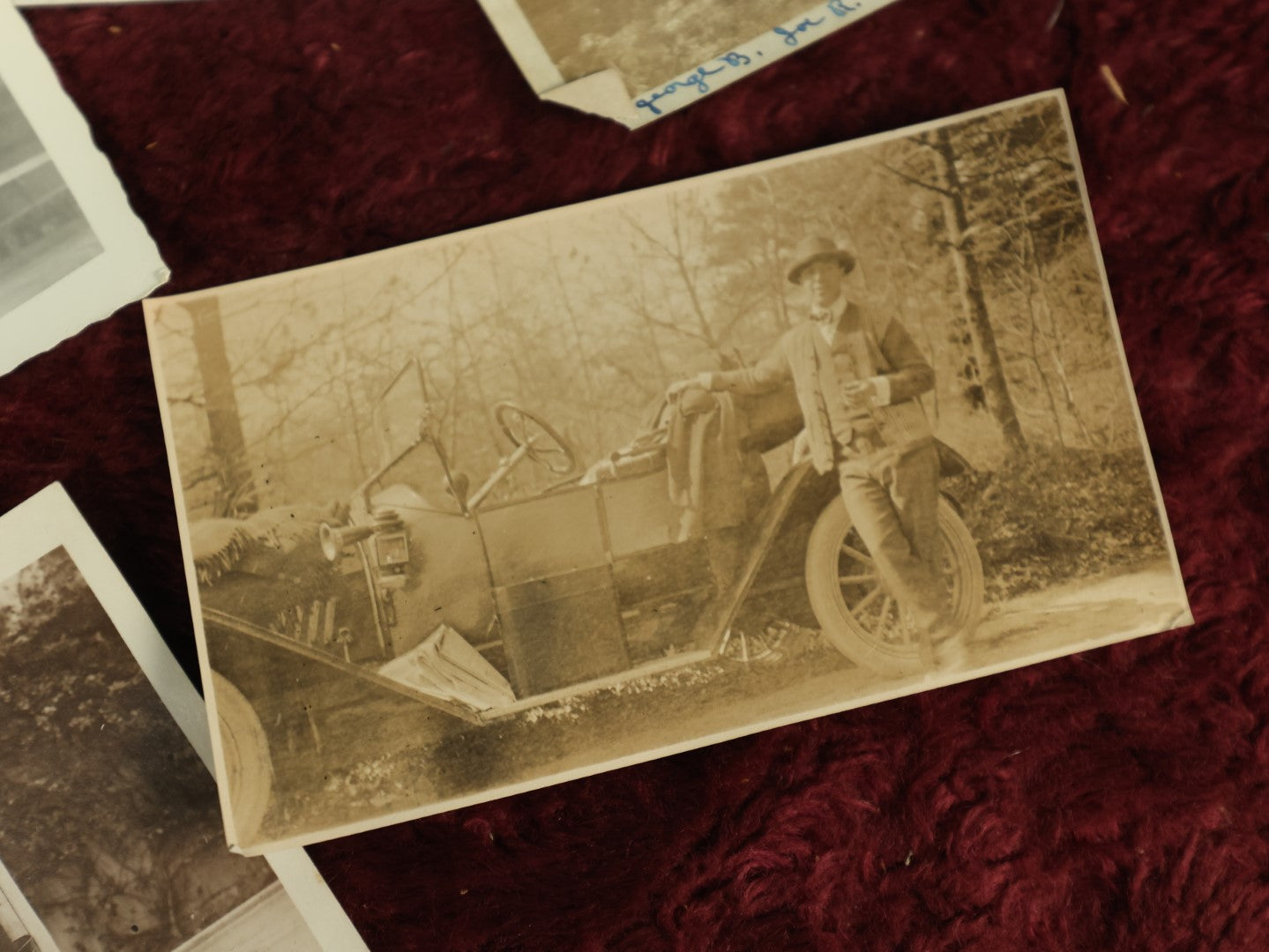 Lot 119 - Snapshot Grouping, Six Photos Of Men Being Men, Hunting, Smoking, Boxing, And Riding On A Teeny Tiny Little Car