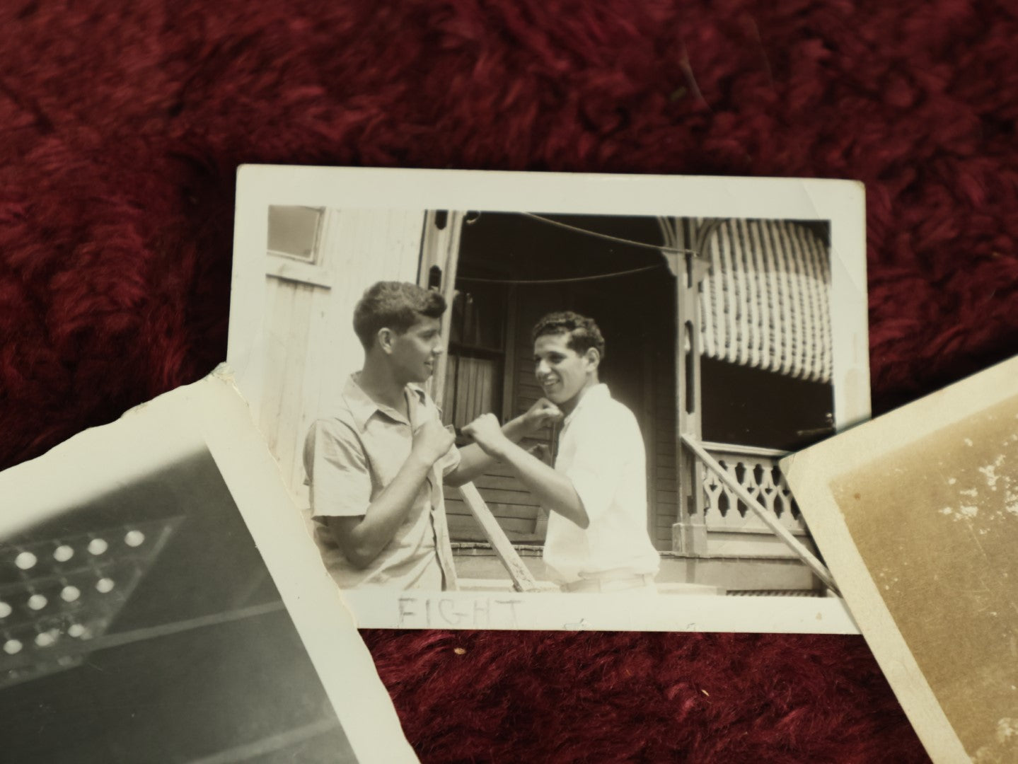 Lot 119 - Snapshot Grouping, Six Photos Of Men Being Men, Hunting, Smoking, Boxing, And Riding On A Teeny Tiny Little Car