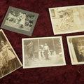 Lot 124 - Snapshot Grouping, Five Photos Of Children And Pets, Including Man Holding Fish, Kids On Bikes, In Prams, And Dog, Etc