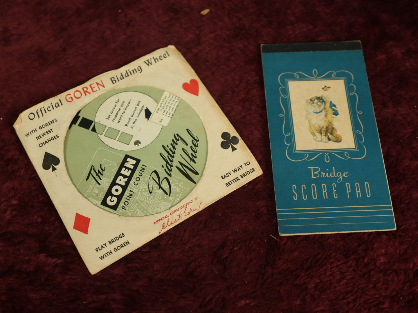 Lot 126 - Pair Of Ephemera Pieces, Official Goren Bidding Wheel And Bridge Score Pad With Kitty