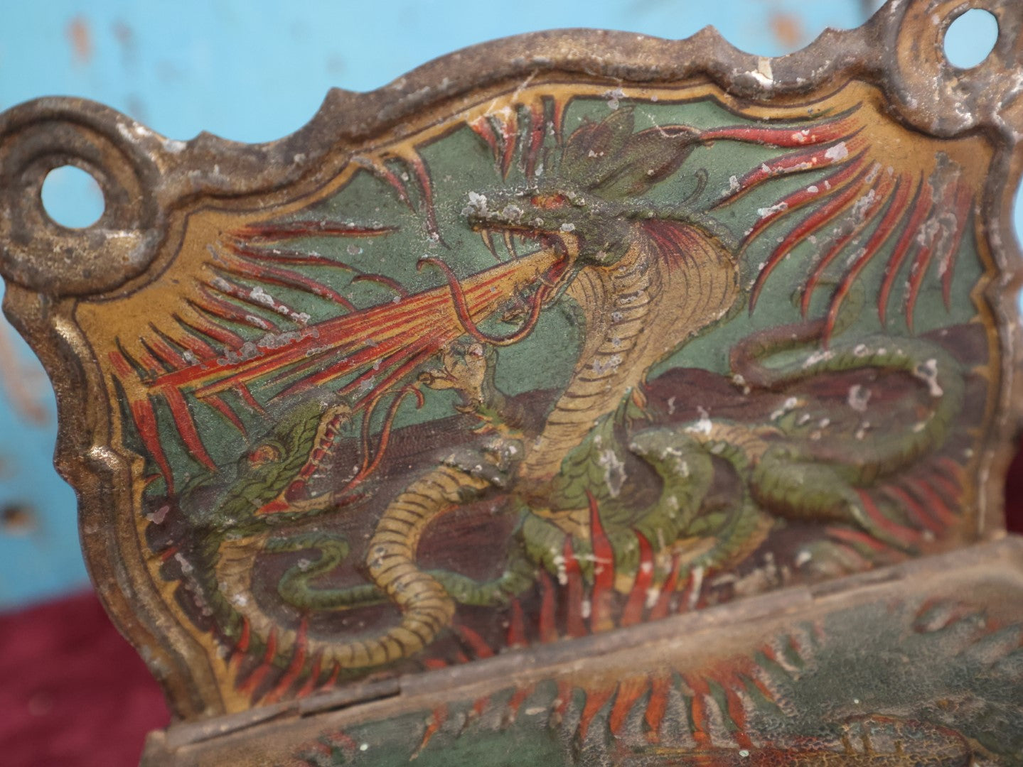 Lot 006 - Antique Tin Lithographed Match Box Safe And Strike With Fire Breathing Dragons And Serpents Motif, Wall Mountable