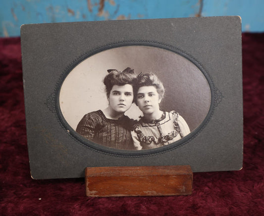 Lot 120 - Simple Small Boarded Photo Of Two Young Women Wearing Dresses And Bows