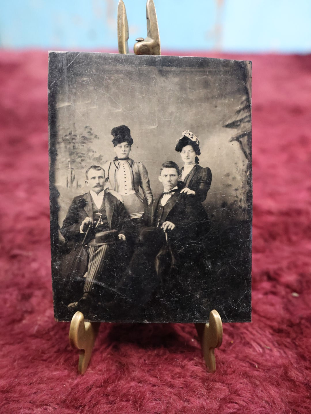 Lot 149 - Single Tintype Photograph, Group Of Four People Two Men, Two Women, Man Holding Cane, Women In Hats