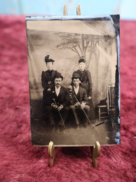 Lot 150 - Single Tintype Photograph, Group Of Four People Two Men, Two Women, Both Men With Canes, Bowler Hats