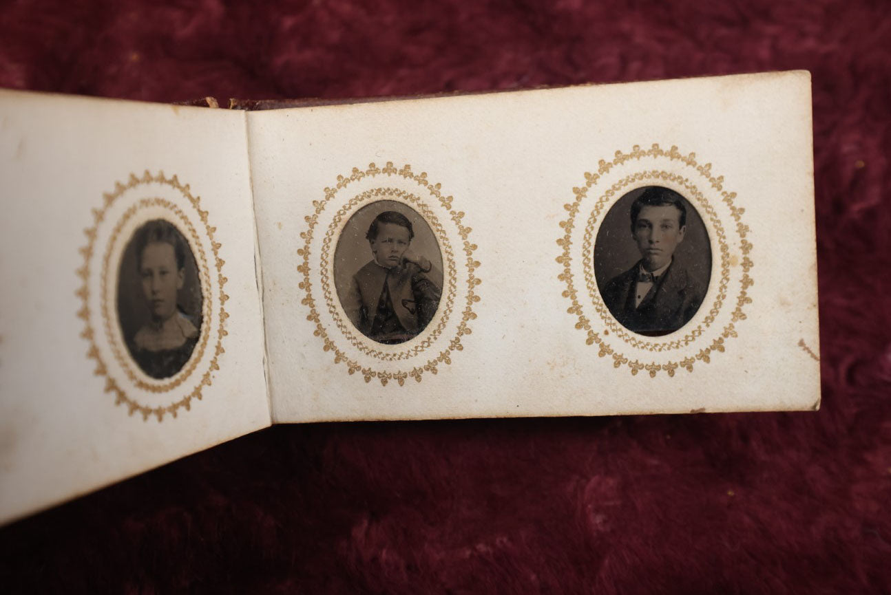 Lot 008 - Full Antique Gem Tintype Photo Album With Approximately 48 Images Of Women, Children, And Men