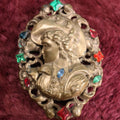 Lot 015 - Large Antique Art Nouveau Brooch With Woman In Hat, Many Colorful (Likely Glass) Gems, Pinback