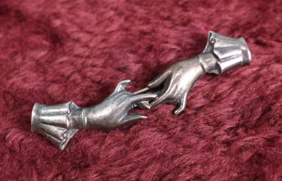 Lot 024 - Vintage Unmarked Silver Toned Brooch With Two Hands With Fingertips Touching, Pin Back