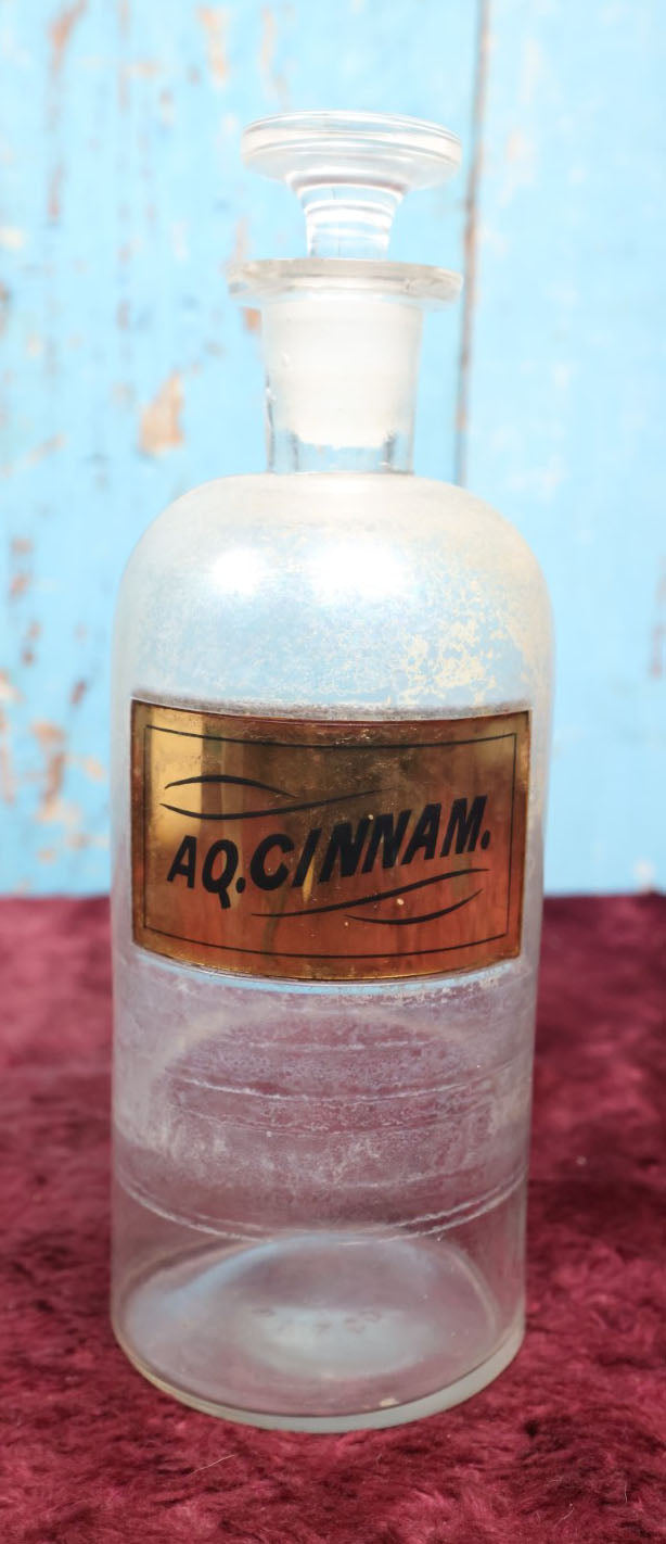 Lot 038 - Antique Cinnamon Water Apothecary Bottle With Glass "Aq. Cinnam." Label, Approximately 12"